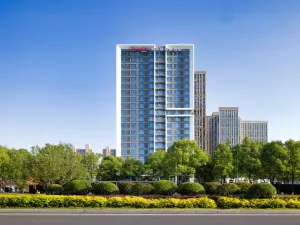 Xinyang Hampton by Hilton Hotel