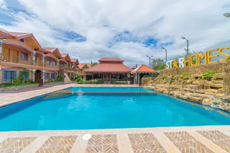 RedDoorz Plus @ Starhomes Olivianville Отели рядом с достопримечательностью «Iglesia Ni Cristo Lokal ng Balibago»