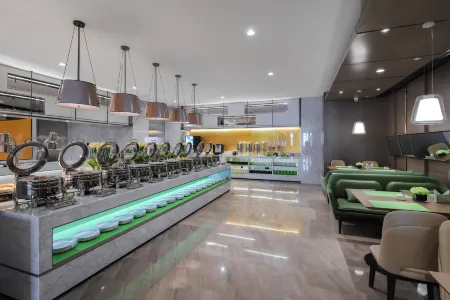 Hampton by Hilton Mengzi Nanhu Отели рядом с достопримечательностью «Honghe College»