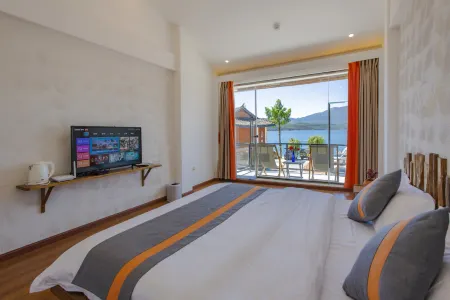 Lugu Lake Elegant Residence Boutique Inn Отели рядом с достопримечательностью «Dazu Pier»