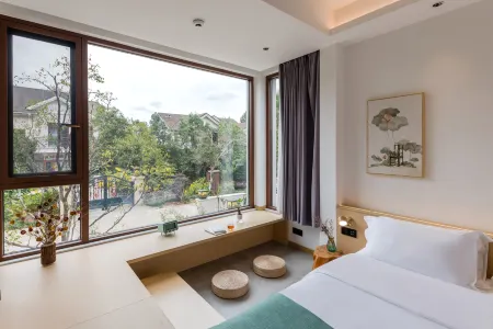 Floral Hotel·Wuyishan Mingzhongle Tea House hotel (Sangu Resort Shuizhuang Branch) Отели рядом со станцией Wuyi Shan Railway Station