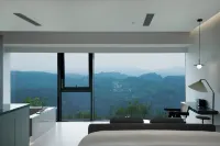 Xinchang Shanzhong Laixin · Guanlan Tingyun Homestay - balcony