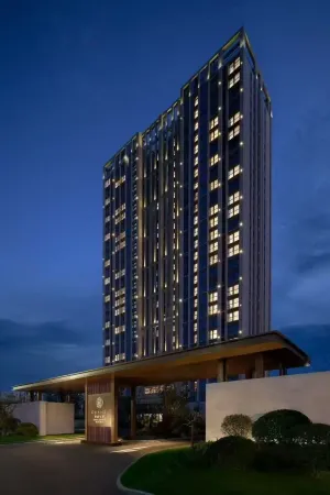 Xuanli Hotel (Fangte Resort Branch, Ningbo University of Finance and Economics) Отели в г. Циси