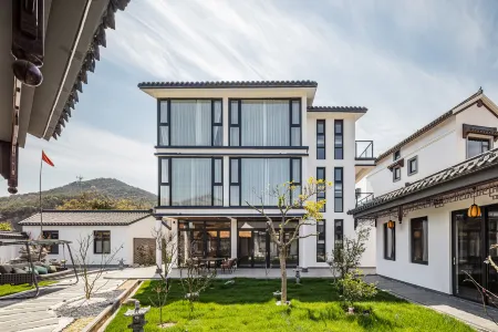 Floral Hotel·Zhujiajian Muting Hotel(Nansha Branch) Отели рядом с достопримечательностью «Tawan Golden Sand Beach»