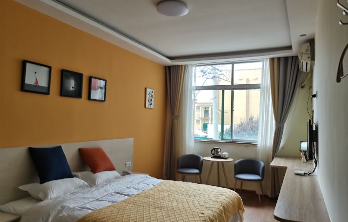 Xingping Aishang Qingshe Hotel