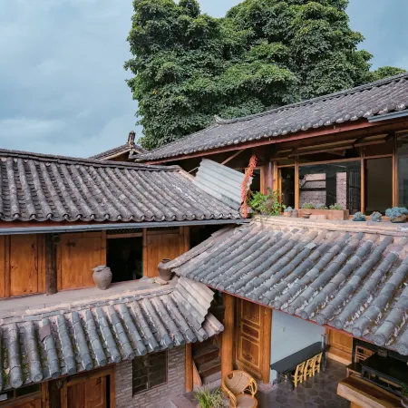 Gujing Inn Отели в г. Юньлун