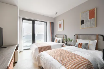 Langyi Exhibition Apartment (Shenzhen International Convention and Exhibition Center Waterfront) Отели рядом с достопримечательностью «Хуа Чжэн Сити»