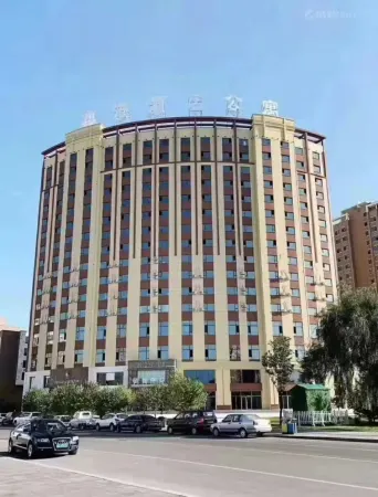 Xingang Serviced Apartment (Meihekou) Отели рядом с достопримечательностью «Northeast All Day Mall»