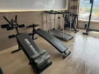 Rishi Xuriling Resort Hotel (Ganzhi County Baita Park Scenic Area Store) - parking