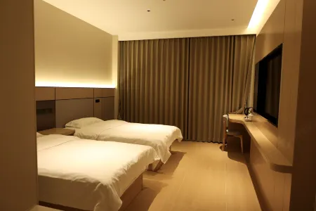 Sanhe International Hotel Отели в г. Фэйси