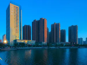 Orange Hotel (Suqian Baolong Plaza)