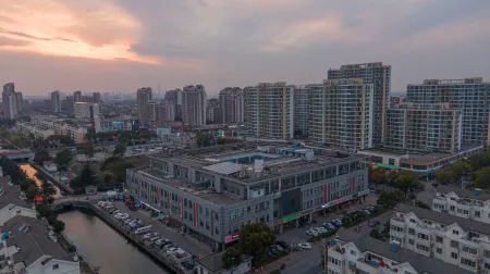 GreenTree Inn (Suzhou Industrial Park Shengpu Town Xinsheng Road) Отели рядом с достопримечательностью «Wansheng Rice Merchants»