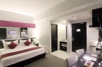 Grand Darmo Suite by AMITHYA Hotels in Wonokromo