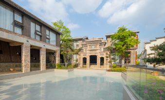 Floral Luxury Hengdian Xindi B&B (Film and Television City Qinwang Palace Dream Valley Branch)