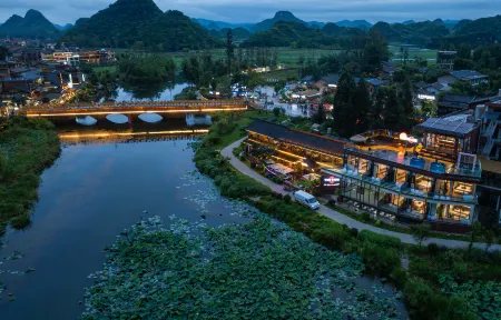 Yunding·Hanging Coffee Panoramic Hotel (Puxinqiao Branch, Puzhehei Scenic Area) Отели рядом с достопримечательностью «Fairy Cave»