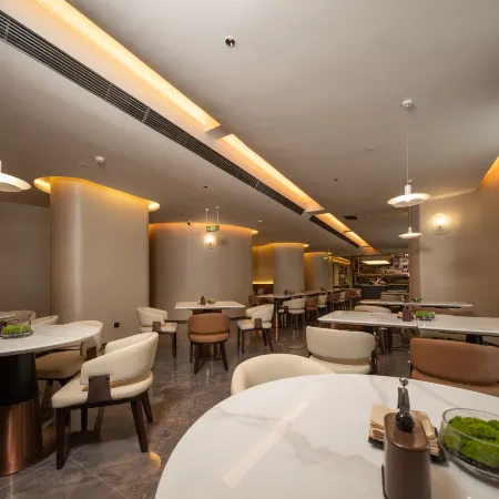 Turpan Guotai Minsheng Plaza Junmin Gongjian Lyuaduo Hotel
