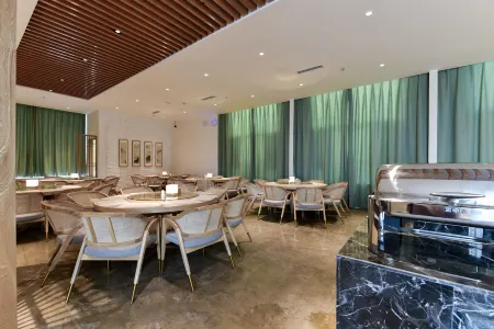 QIANNA LINQI HOTEL (Jiaozuo Jianshe Road Railway Station Branch) Отели рядом с достопримечательностью «Jiaozuo University»