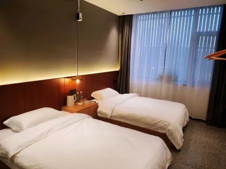 Guanshan Zhumoye Yingsu Hotel (Xinzhou Ancient City) Отели рядом с достопримечательностью «Xinzhou Ancient City - South Gate Tower»