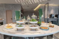 Inzone Garland Collection Hotel (Guan County Guanyichun Road) - sarapan
