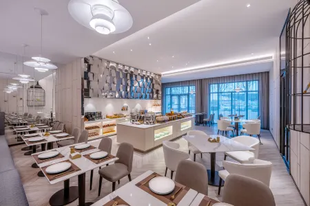 Orange Hotel (Qingdao Chengyang Xiaozhaizi Station) Отели рядом с достопримечательностью «Chengyang Century Park»