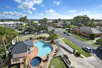 The Atrium Resort Hotels near Sunglass Hut Harbour Town Premium Outlets