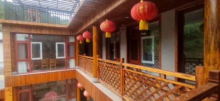 Zoupingxingquan Farm House Отели в г. Луаньпин