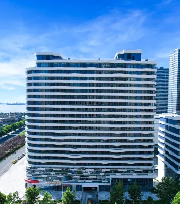 Yuhai Apartment Hotel (Development Zone Shibeiwan Water Park)