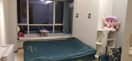 Qingyi Apartment Отели рядом с достопримечательностью «Zhangjiagang Campus， the City Vocational College of Jiangsu (Binjiang Avenue)»