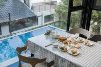 Juesu Hot Spring Hostel - ที่มีสระว่ายน้ำ