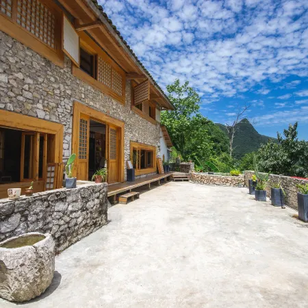 Guanwang Guesthouse Отели в г. Синъи