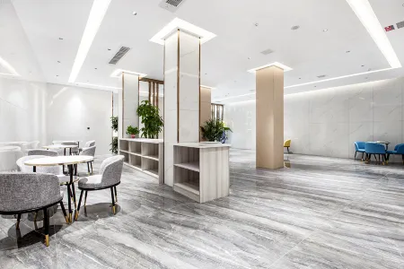 Ni Hao Hotel (Weng'an County Jinmei Times Square) Отели в г. Вэнъань