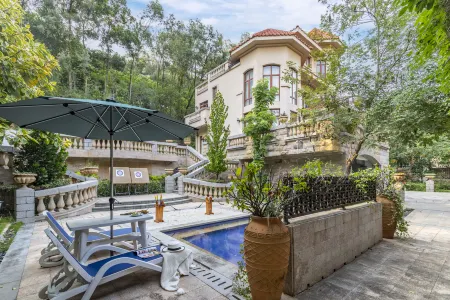 Heyuan guest world fun villa Annan Peninsula hot spring villa Отели рядом с достопримечательностью «Spring Woods»
