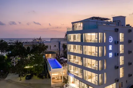 Sanya Xingye sea view design B & B Отели рядом с достопримечательностью «Tianyazhen»