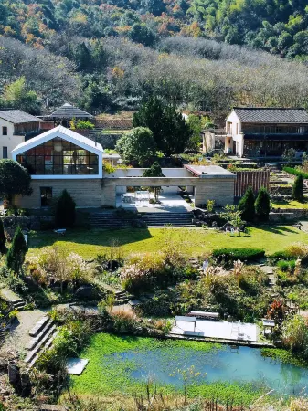 Sheng Tian She village Отели в г. Синьчан