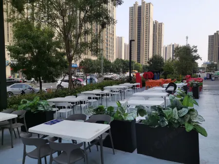 Xingyang Milan Inn (Haobusi Ka Store) Отели рядом с достопримечательностью «Xingyang People's Park»