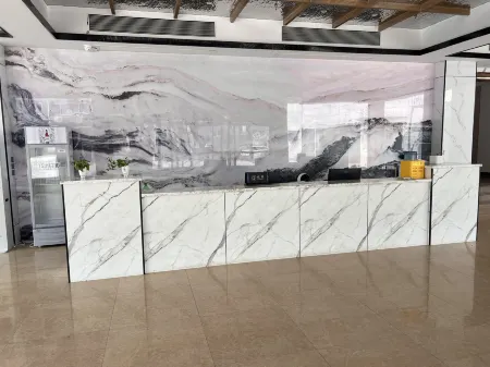 Junhe Business Hotel Отели в г. Аньянсянь