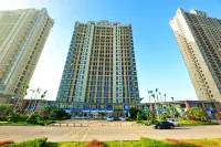 Yumi Holiday Apartment (Zhaoqing Dream City) Hotell i Gaoyao