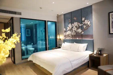 Magnotel Hotel (Anxi Tea Capital Baolong Plaza) Отели в г. Анси