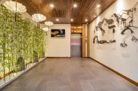 โรงแรมหัวจิหยาบเชอ (สถานีฉางซิงใต้ สวนเมืองโบราณ) โรงแรมในฉางซิง