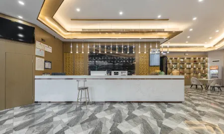 Quankai Business Hotel (Hefei Feidong Longtang East China Building Materials Center Store) Отели рядом с достопримечательностью «Hefei Longxi Zoo»