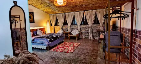 Xinlv Time Inn (Yuanyang Terraced Field Scenic Area) Отели рядом с достопримечательностью «Pu Gao Lao Zhai»