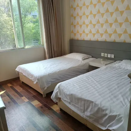 Yongxiu Love Apartment Hotel Отели рядом с достопримечательностью «bai lian hu shi di gong yuan»