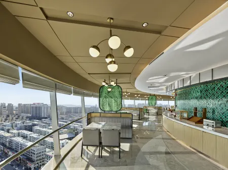 Hilton Garden Inn Anshan Haicheng Отели рядом с достопримечательностью «Kuixing Building»