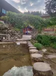 Leishan Xipan Xianshe Homestay - Bar