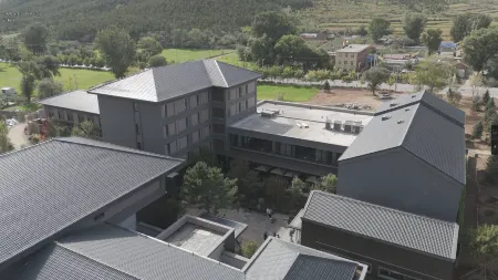 Shanyutang Spring resort hotel Отели в г. Линюань