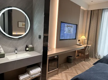 YongChangYuan Garden Hotel Отели рядом с достопримечательностью «Wulongshan Wild Animals Kingdom»