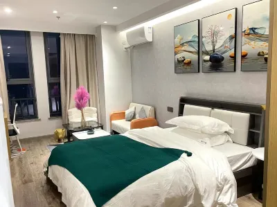 Baxi Homestay（Huaihua South Station Wanda Store）