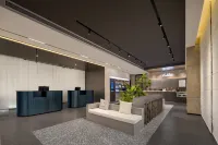 濟南高新區遙牆國際機場輕居飯店