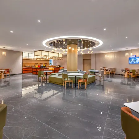 Magnotel Hotel (Dingzhou Municipal Government Times Square)
