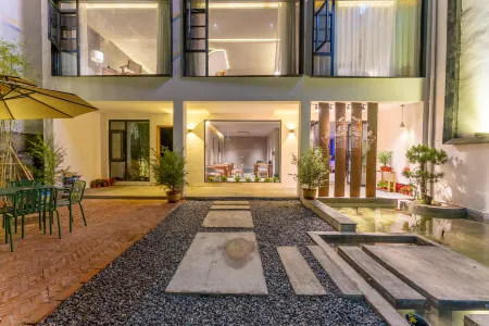 Moye Guesthouse Отели в г. Луньчуань